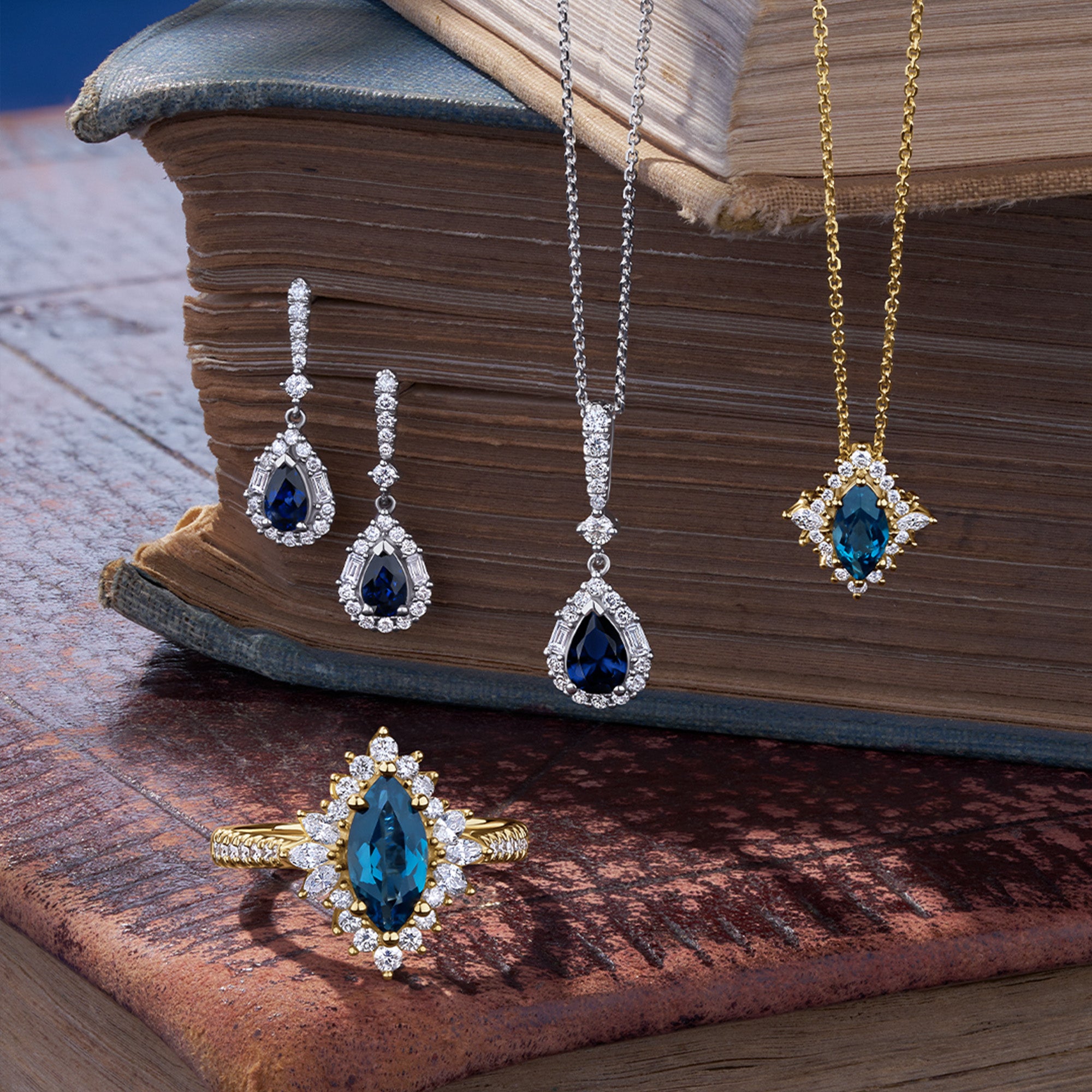 Bluebird™ London Blue Topaz & Diamond Marquise Halo Pendant with Chain in 9ct Yellow Gold