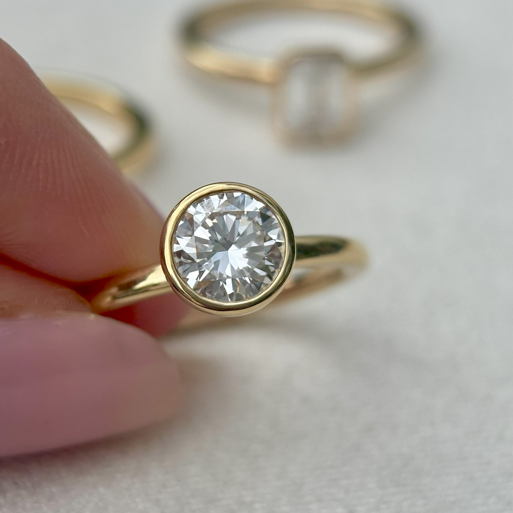 Everlasting 1.25ct TW Round Brilliant Lab-Grown Diamond Bezel Set Solitaire Engagement Ring in 18ct Yellow Gold