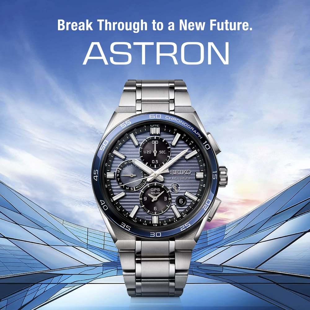 Silver Seiko Astron watch with a blue dial