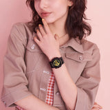 Casio Baby-G BA110X-1A women's watch front view, featuring a 46.3mm all-black round resin case with a deeply layered three-dimensional dial, gear-inspired index markings, analogue hands, and a lower digital LCD display window.