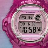 Close-up of the dial on the Casio BABY-G BG169CM-4D Digital Women's Watch, showing the translucent pink colour dial and digital display detail. The camouflage bezel pattern is shown up close.