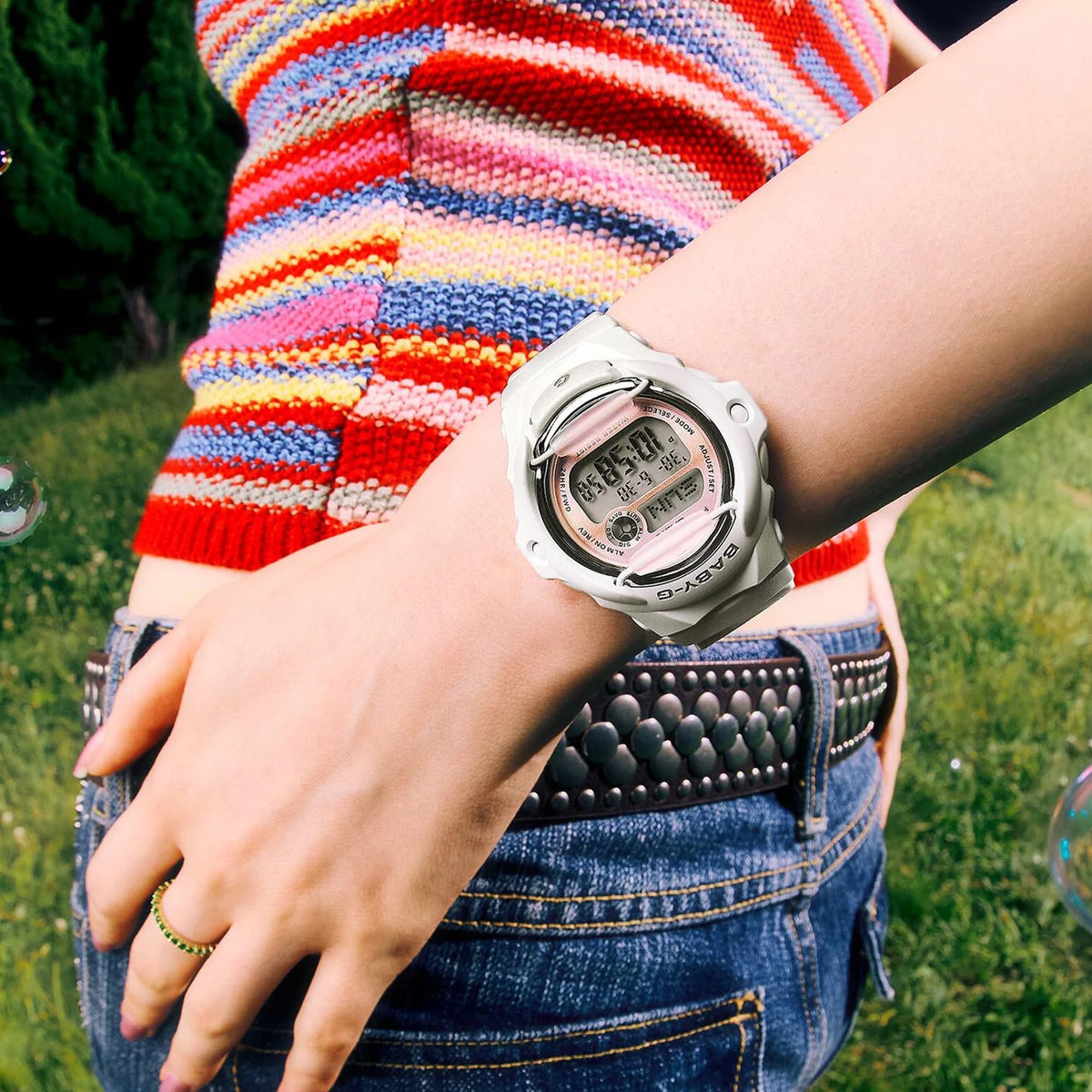 The Casio Baby-G Digital Women's Watch BG169GD-7D, 42mm case, worn on the wrist to show scale and fit. The matte off-white resin case and band suit everyday casual wear.