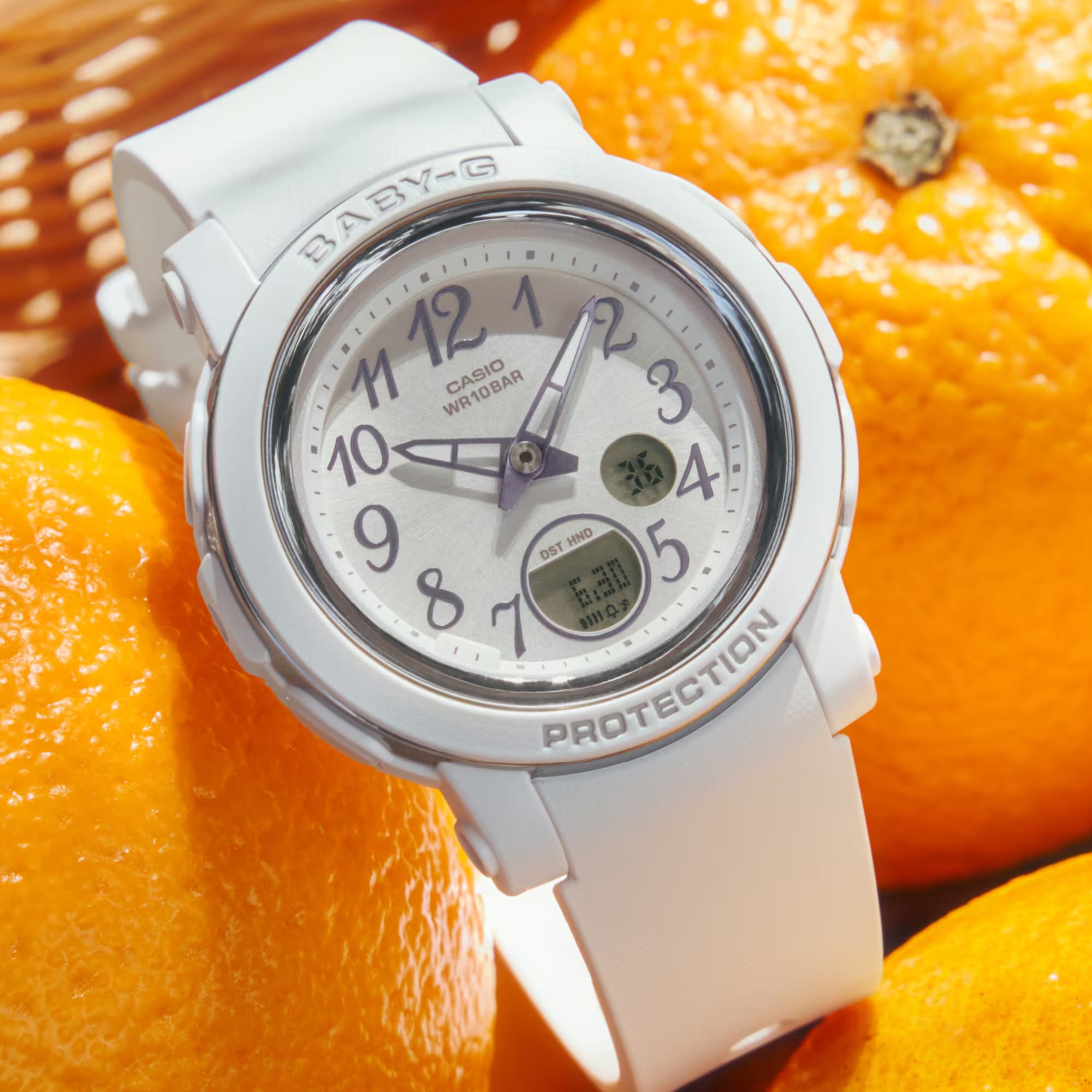 From this angle, the Casio Baby-G BGA290SA-7A reveals the glossy silver vapour deposition bezel ring shimmer, soft white resin case, and the coordinated silver metallic Arabic numerals and bezel finish together.