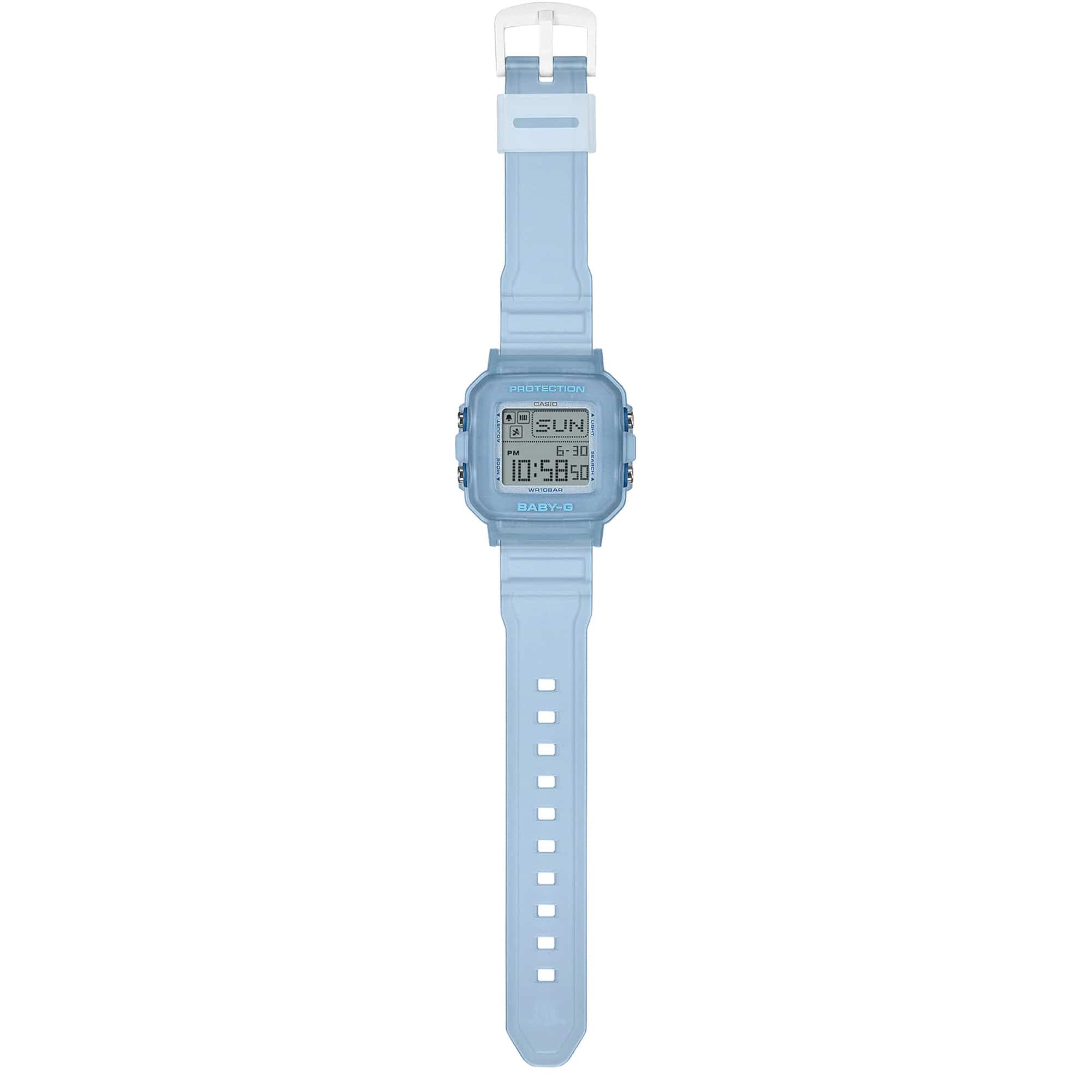 The Casio Baby-G BGD10KG-2D is fitted with a translucent blue glitter resin band with the included customisable silicone holder with acrylic panels shown alongside, confirming shock-resistant and 100-metre water-resistant construction.