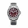 Citizen Promaster GMT BJ7150-50W - The red dial features crisp white markers, orange accents, and a fixed 24-hour GMT bezel for tracking a second time zone. A discreet date window sits at the 3 o'clock position.