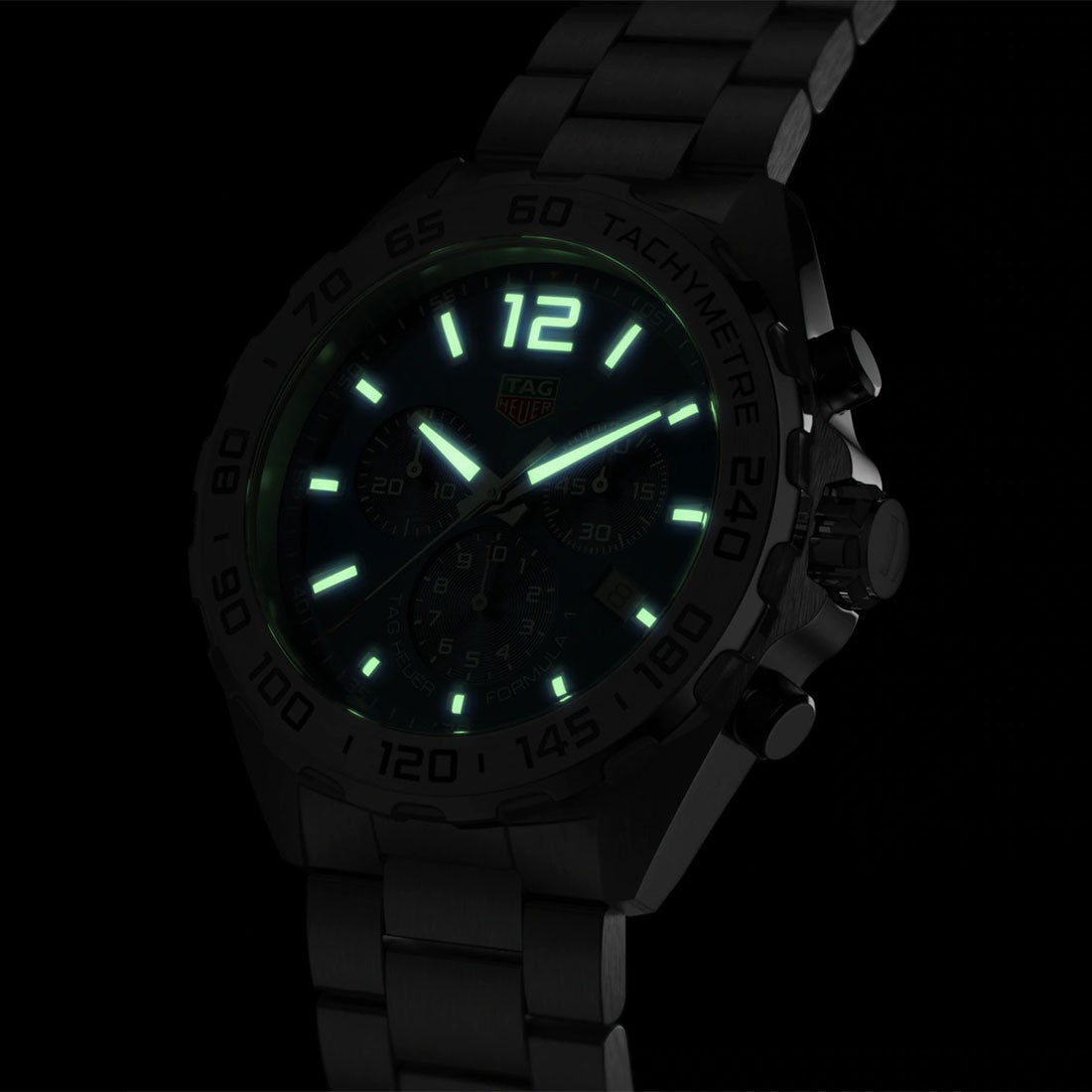 Darkened Tag Heuer watch with Lume