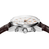 TAG Heuer Carrera Chronograph CBN2013.FC6483 photographed from a side profile, showing the case thickness and chronograph pusher placement. The brown leather strap and push-pull crown are visible together in frame.