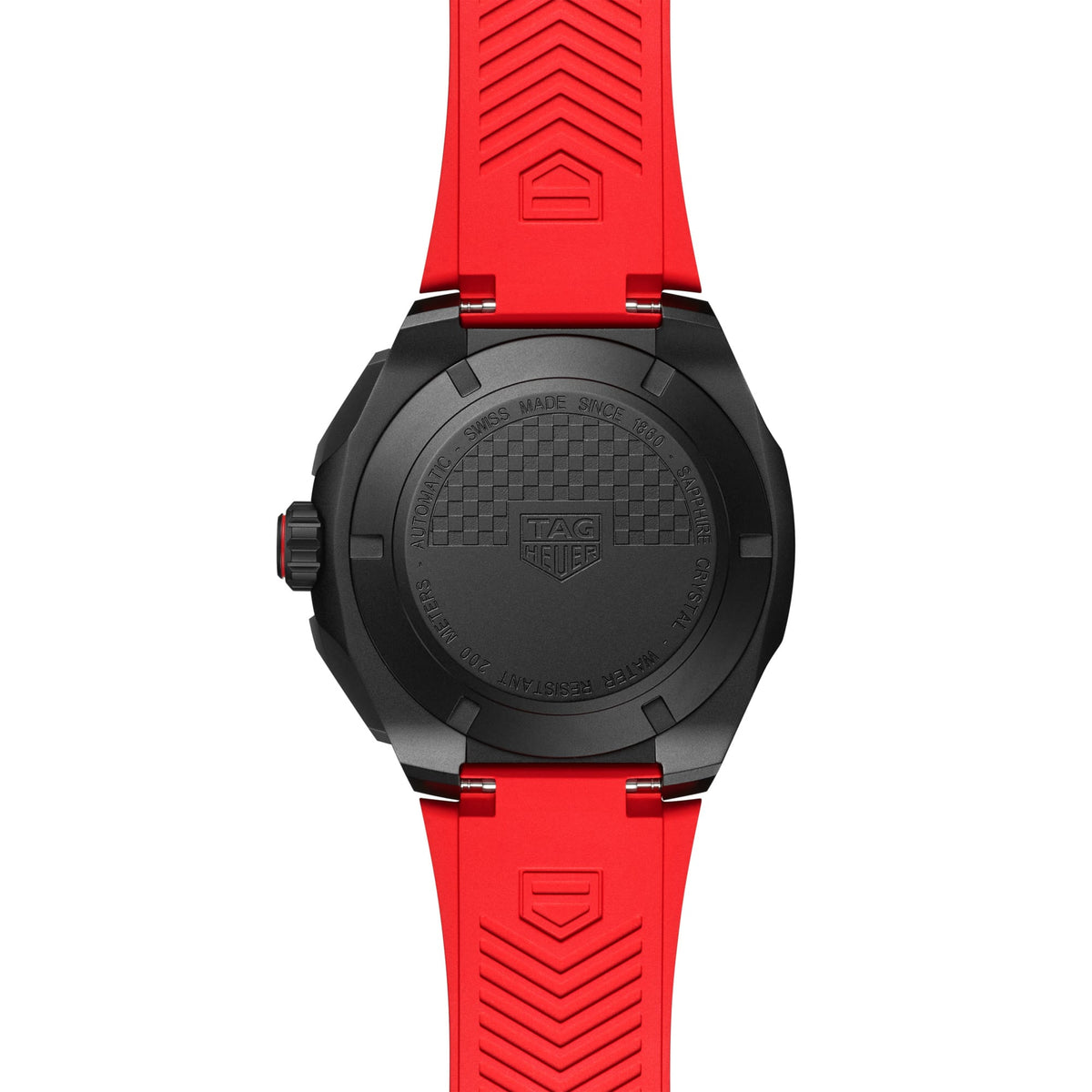 TAG Heuer Formula 1 Chronograph CBZ2085.FT8093 shown from the case-back, displaying the solid black DLC-coated titanium caseback over the Calibre 16 automatic movement. The red rubber strap is visible alongside the case-back detail.
