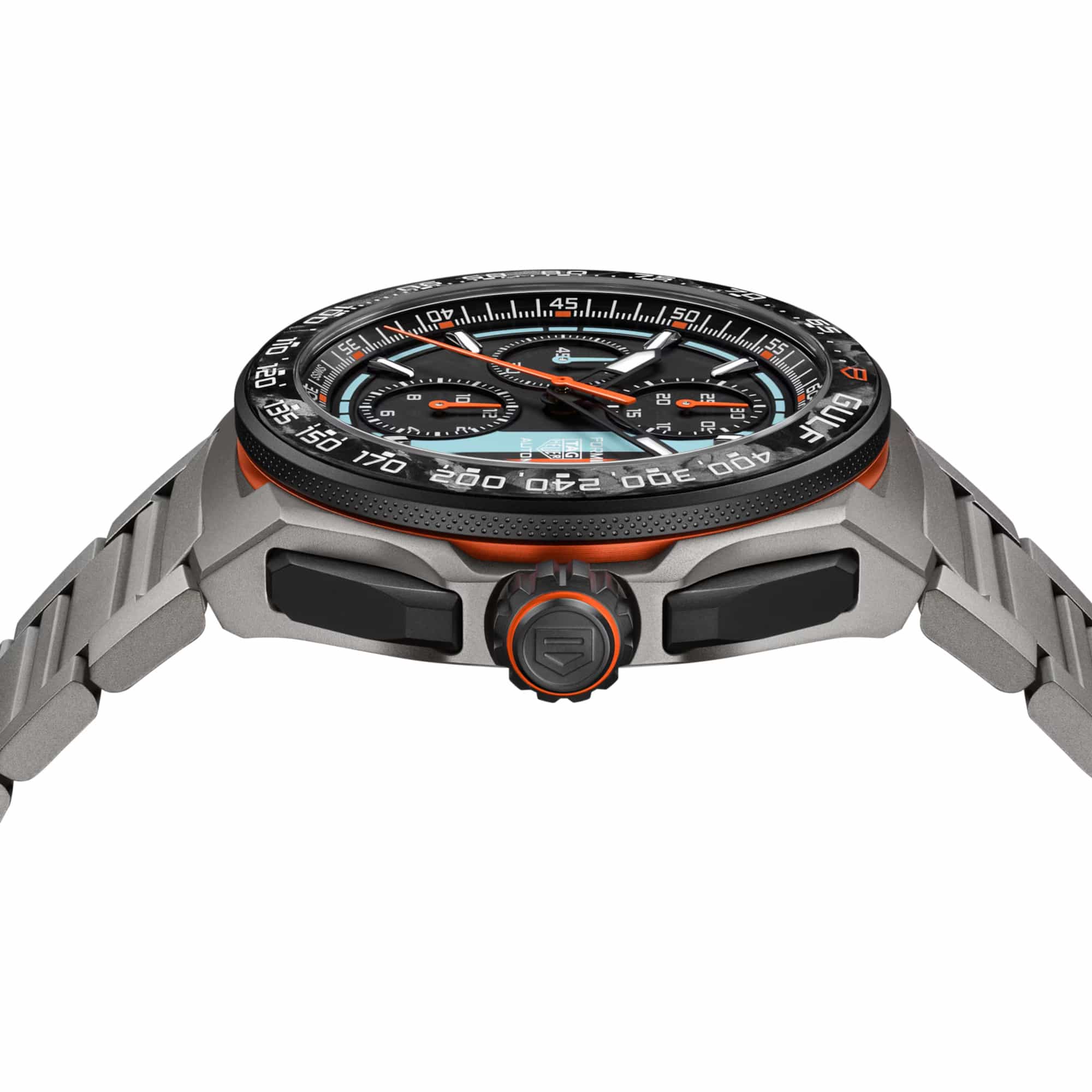 TAG Heuer Formula 1 Chronograph x Gulf CBZ208B.BF0009 photographed from a side profile, showing the case thickness and black DLC-coated screw-down crown. The titanium bracelet and forged carbon bezel are visible together in frame.