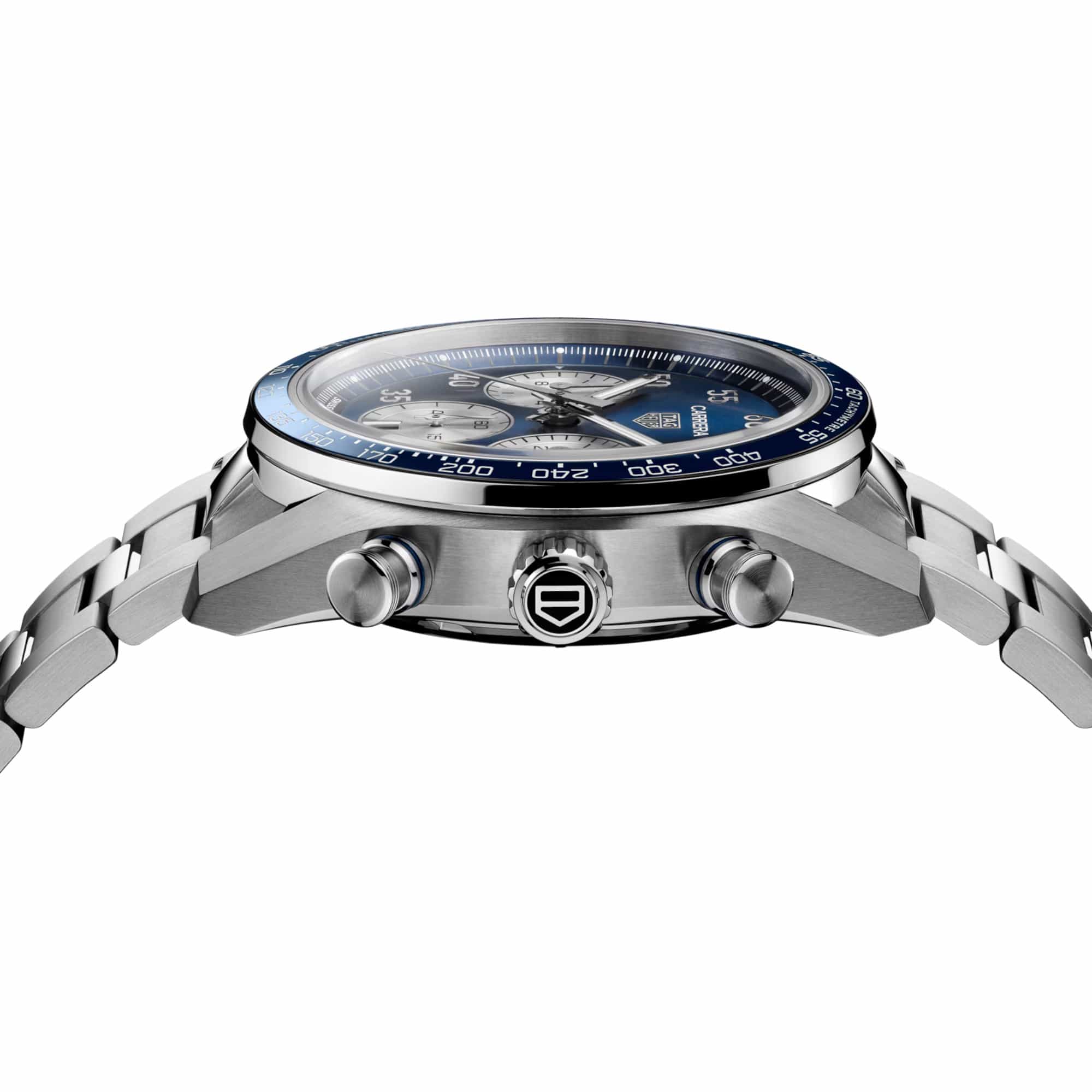 TAG Heuer Carrera Chronograph Sport CDB2111.BA0054 photographed from a side profile, showing the case thickness and steel crown. The steel bracelet and blue ceramic bezel are visible together in frame.