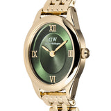 Close-up of the emerald green sunray dial on the Daniel Wellington Ophelia Mini Women’s 22mm Quartz Watch DW00100804. The gold Roman numerals, circular centre pattern and slim gold hands are shown in detail.