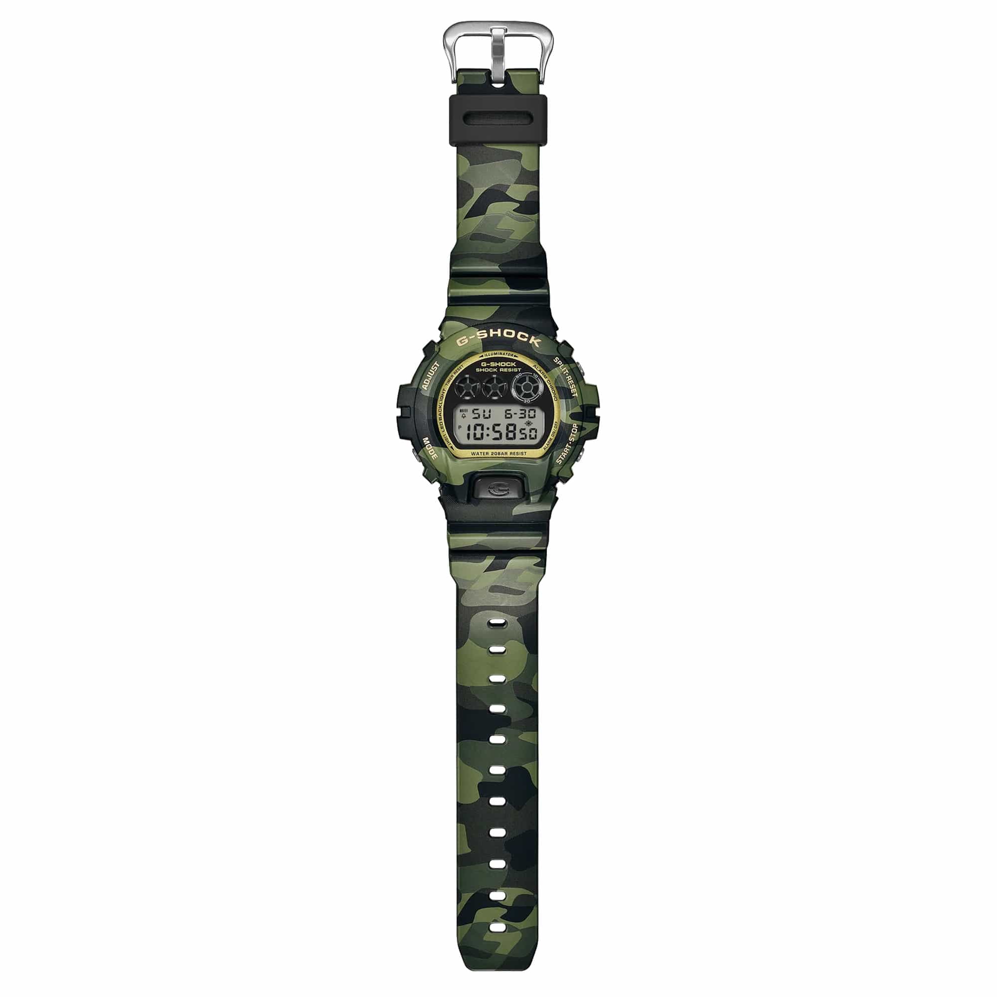Casio G-Shock DW6900CMG-3D close-up of the green camouflage MAP-printed resin band, featuring the exclusive G-Shock pattern that playfully conceals the iconic G-mark.