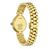 Detail of the gold-tone stainless steel bracelet and deployment clasp with push-button release.