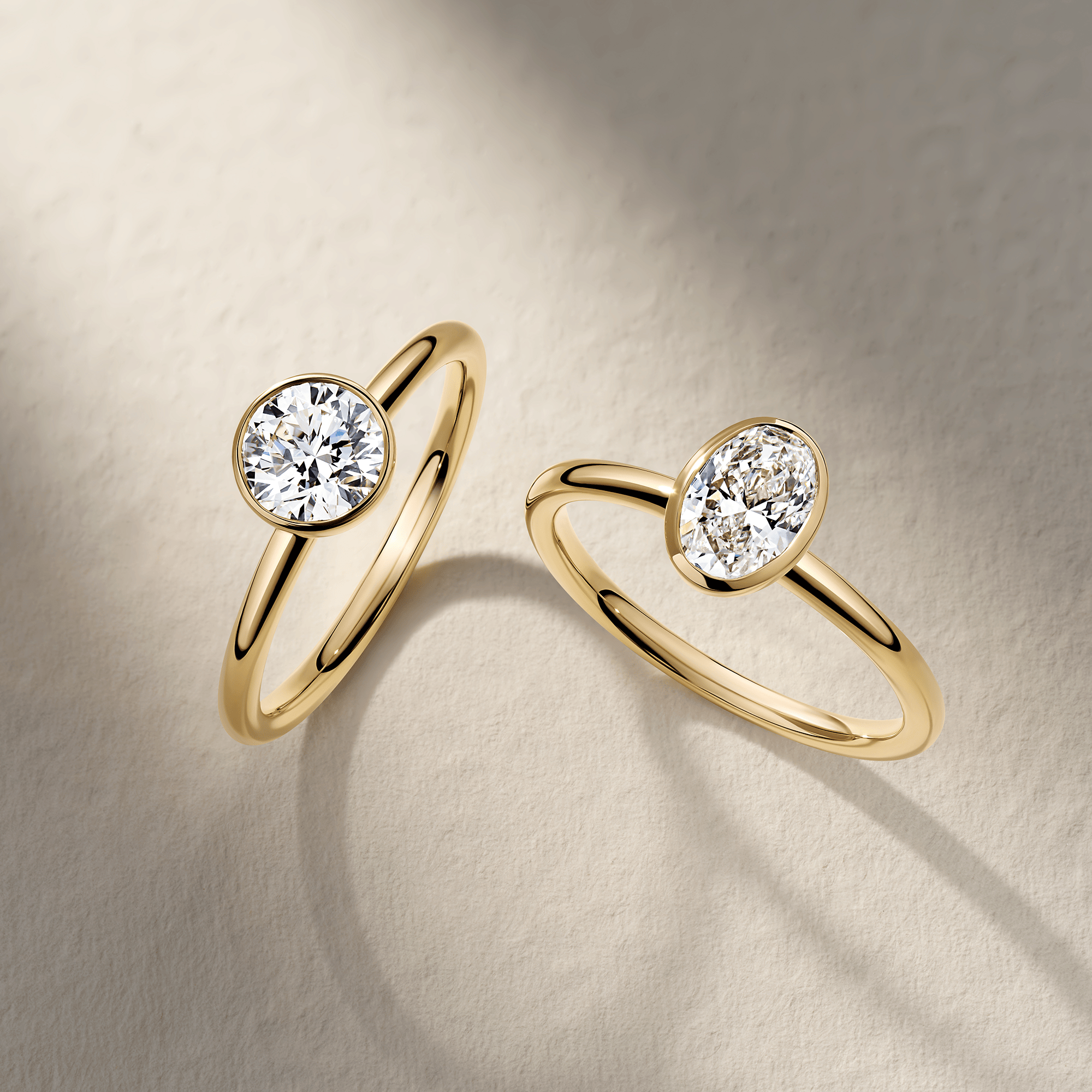 Everlasting 1.25ct TW Lab-Grown Diamond Oval Cut Bezel Set Solitaire Engagement Ring in 18ct Yellow Gold