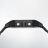 Side profile of the Casio Vintage Digital Watch F-B100W-1A, showing the slim black resin case depth. The bio-based resin strap is visible along the watch's profile.