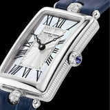 Frederique Constant Classic Carrée Quartz Women's 28mm Watch FC-200MPW2AC2D6 styled in a lifestyle setting, reflecting its elegant, Art Déco-inspired design suited to dressier occasions. The mother-of-pearl dial and diamond detailing complement a refined, feminine look.