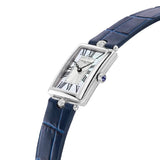 Frederique Constant Classic Carrée Quartz Women's 28mm Watch FC-200MPW2AC2D6 photographed at a three-quarter angle, highlighting the fluted crown set with a blue cabochon and the diamond detailing along the case. The blue leather strap complements the case finish.
