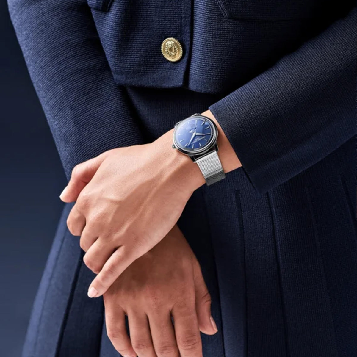 Frederique Constant Classic Quartz 37mm Watch FC-206N3S6B worn on the wrist, demonstrating the comfortable fit of its 37mm case and Milanese mesh bracelet. The moonphase display adds a subtle decorative detail to the wrist.