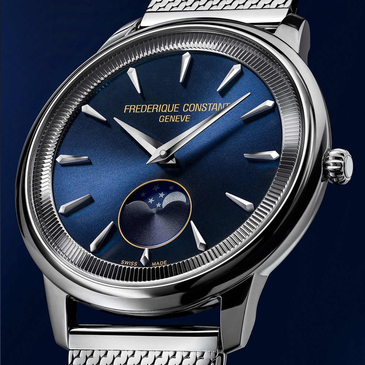 Frederique Constant Classic Quartz 37mm Watch FC-206N3S6B styled in a lifestyle setting, reflecting its refined, versatile design suited to both professional and evening occasions. The navy blue dial and Milanese mesh bracelet complement a sophisticated, understated look.