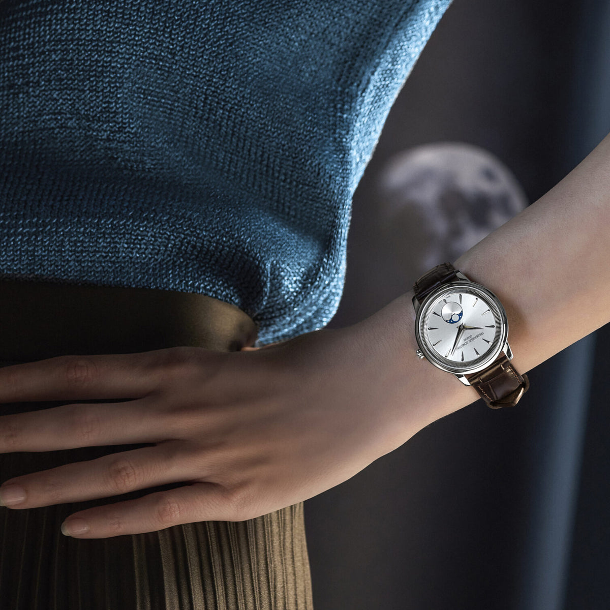 Frederique Constant 37mm Quartz Moonphase Watch FC-206S3S6 worn on the wrist, demonstrating the comfortable fit of its 37mm case and leather strap. The moonphase display adds a subtle decorative detail to the wrist.
