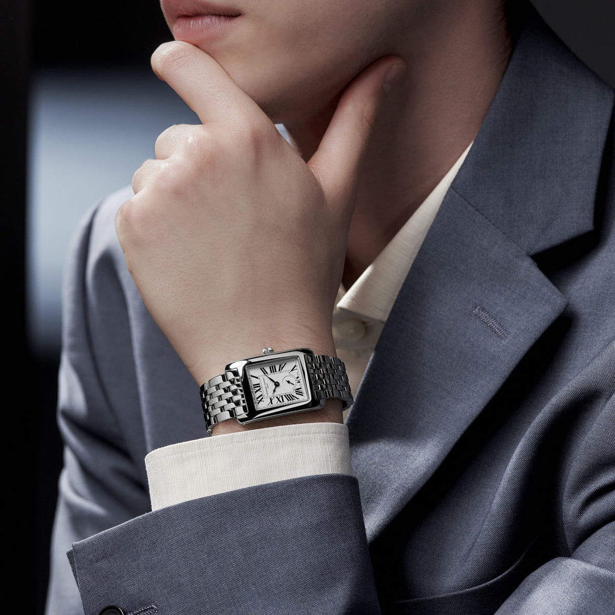 The Frederique Constant Classics Carree Small Seconds Unisex 36 x 25mm Quartz Watch FC-235S2C6B worn on the wrist, showing its slim rectangular case. Inspired by the Art Deco watches of the 1920s and 1930s, it suits both everyday and dressier outfits.
