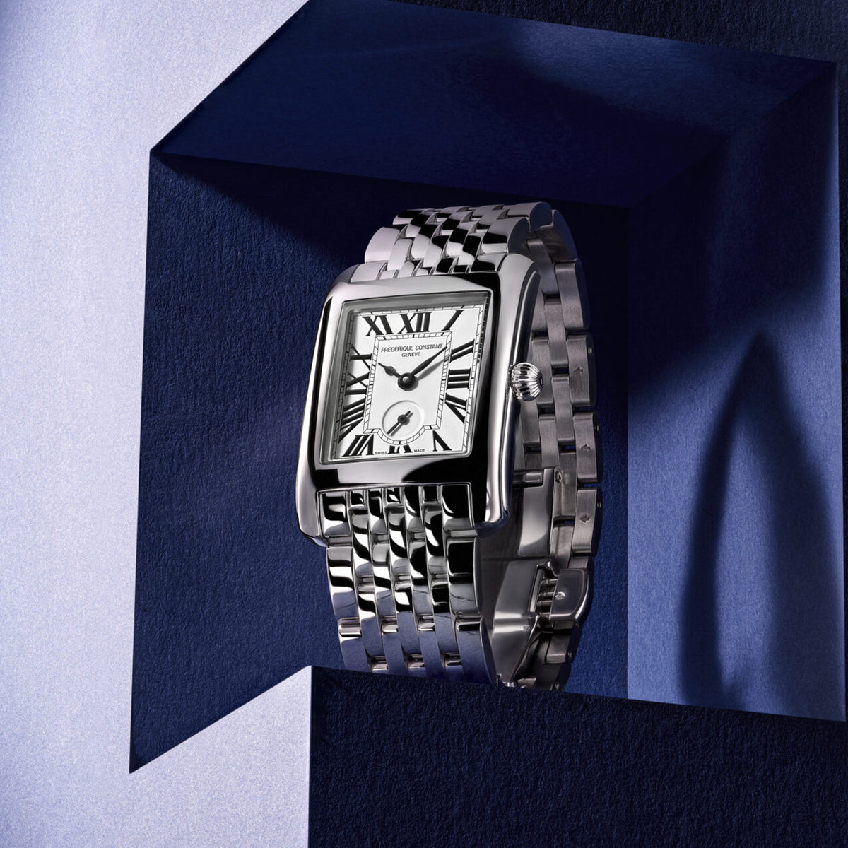 Three-quarter angle view of the Frederique Constant Classics Carree Small Seconds Unisex 36 x 25mm Quartz Watch FC-235S2C6B, showing the slim case profile and crown. The angle highlights the polished stainless steel case and its clean, straight Art Deco lines.