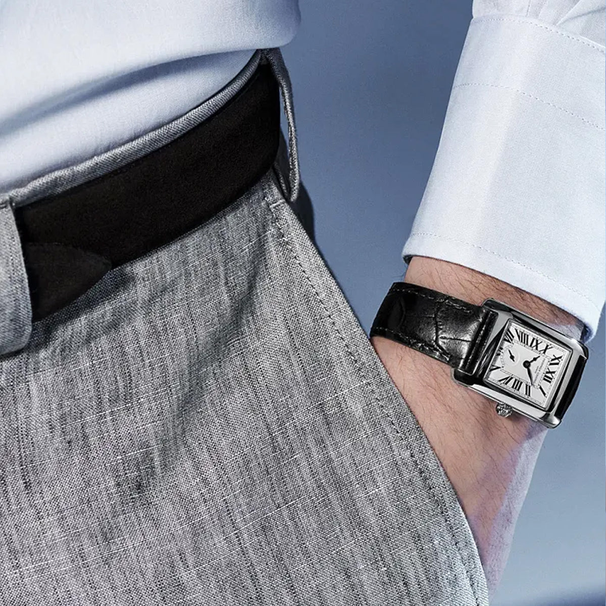 Frederique Constant Carrée Quartz Watch FC-235S2C6 worn on the wrist, demonstrating the fit of its slim rectangular case and leather strap. The architectural silhouette sits comfortably close to the wrist.