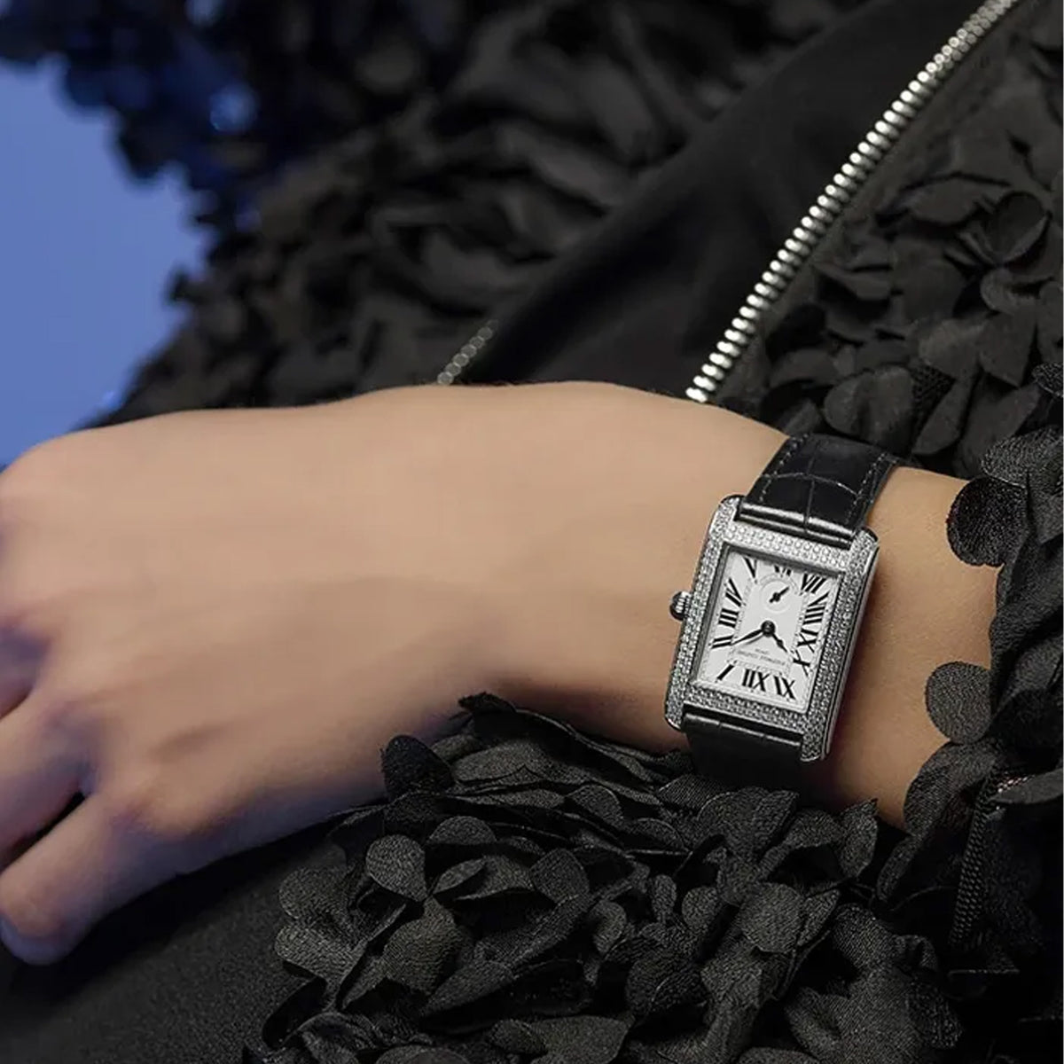 Frederique Constant Classic Quartz Women's 36mm Watch FC-235S2CD6 worn on the wrist, demonstrating the fit of its slim rectangular case and leather strap. The diamond bezel adds sparkle and dimension on the wrist.