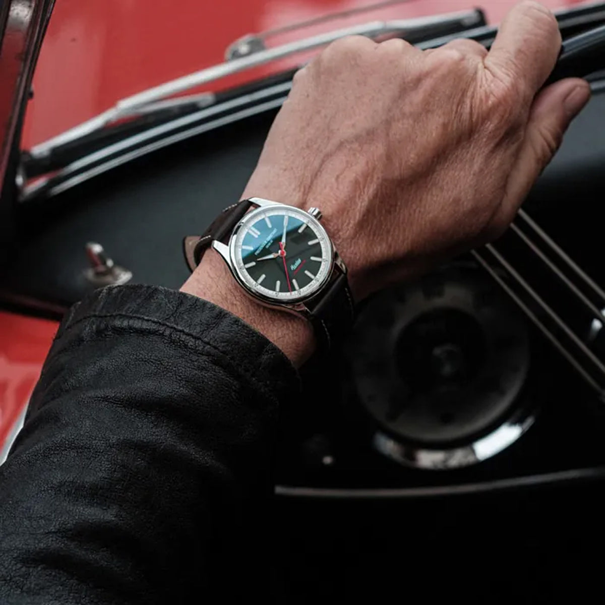 Frederique Constant Classic Men's 40mm Chronometer Watch FC-301HGRS5B6 worn on the wrist, demonstrating the fit of its 40mm case and perforated leather strap. The vintage rally styling sits comfortably for everyday wear.