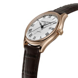 Frederique Constant Men's 40mm Stainless Steel Automatic Watch FC-303MC5B4 photographed at a three-quarter angle, highlighting the rose gold-tone case profile and convex sapphire crystal. The brown crocodile-embossed leather strap complements the case finish.