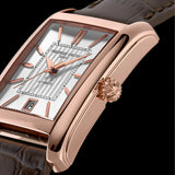 Frederique Constant Classics Carrée Automatic Men's 30mm Watch FC-303V4C4 styled in a lifestyle setting, reflecting its retro 1920s-inspired design suited to smart-casual and formal occasions. The rose gold-tone finish and leather strap complement a refined, vintage-influenced look.