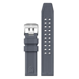 Close-up of the buckle on the black rubber strap of the Luminox Bear Grylls Survival Land Men's 43mm Quartz Watch XB.3716. This Bear Grylls Survival Land 3710 Series strap pairs with the watch's lightweight ALUMI-NOX aluminium case.