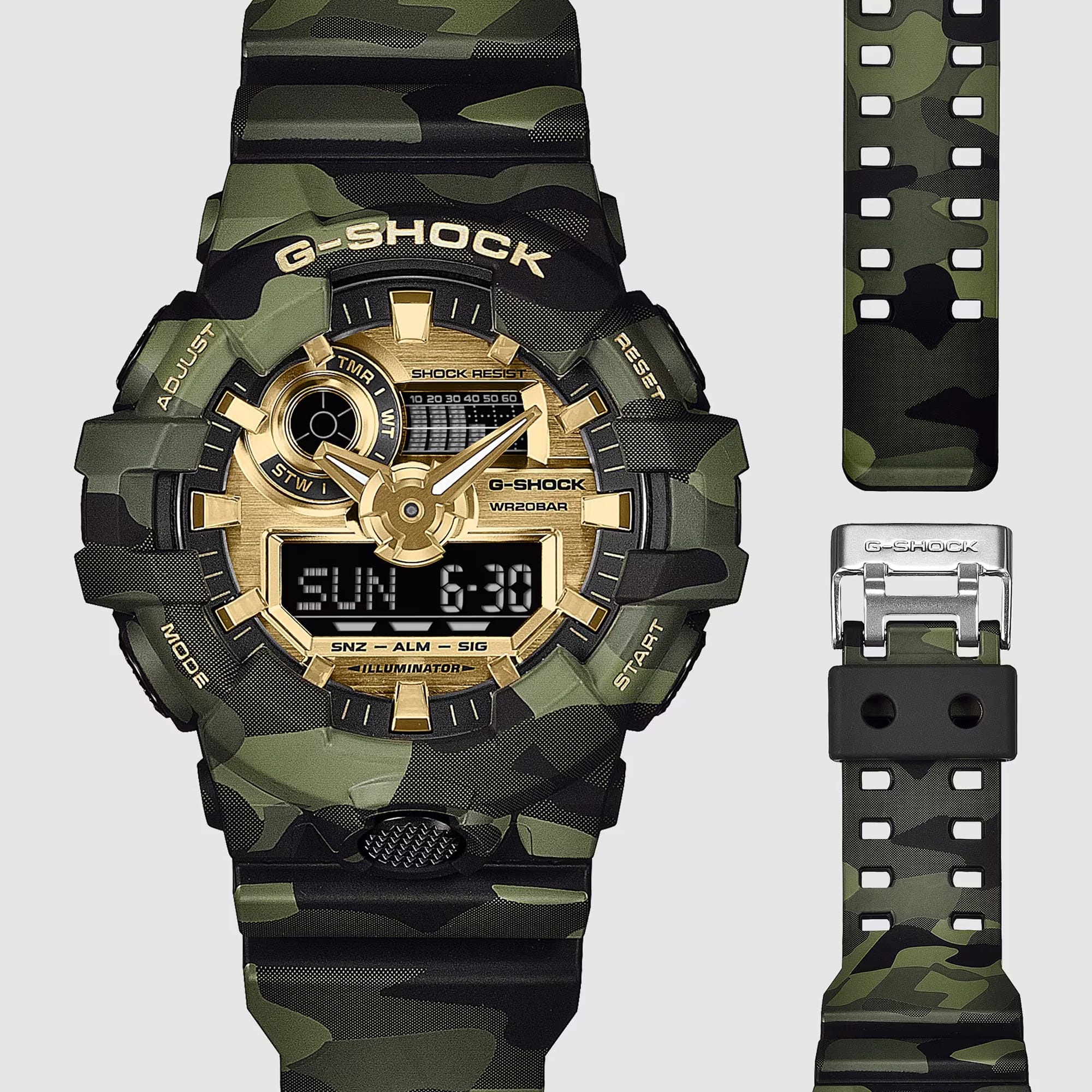 From this angle, the Casio G-Shock GA700CMG-3A reveals the depth of the camouflage MAP-printed bezel, the gold vapour deposition dial shimmer, and the signature front button at 6 o'clock together.