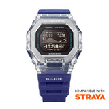 Casio G-SHOCK G-LIDE GBX100S-2D digital watch front view, featuring a square-case design with a dual-material bezel of stainless steel and translucent purple resin, high-definition MIP LCD display, and silver-tone accents.