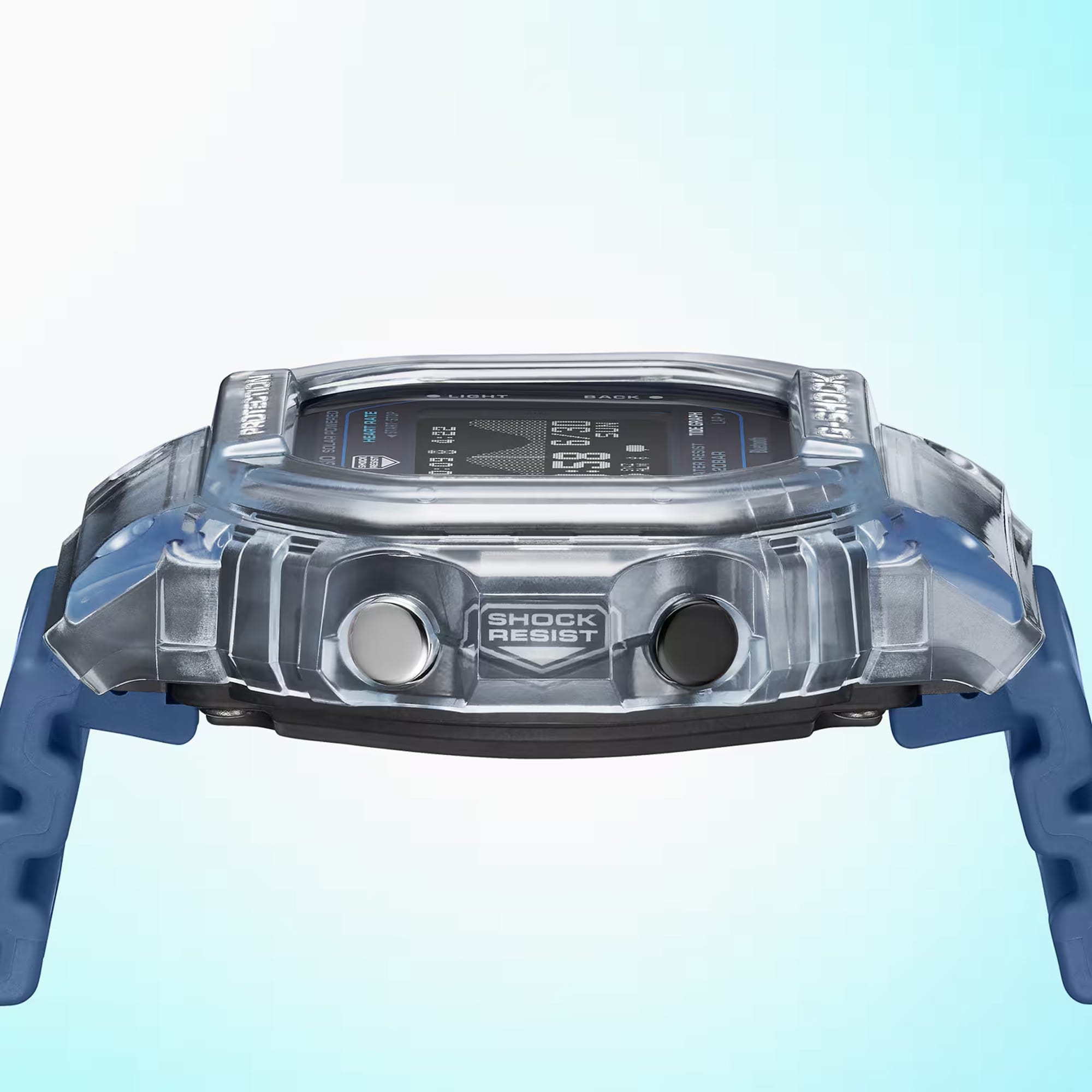 Close-up side view of the Casio G-LIDE GBXH5600-2D Blue Digital Watch showing the case back and band attachment. Internal case construction is visible through the translucent bezel material.