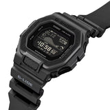 Casio G-LIDE GBX100NS-1D digital surf watch with black resin band, MIP LCD display, Bluetooth connectivity, and tide graph functions.