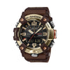 Front-on view of the Casio G-SHOCK Mudmaster Analogue Digital Men's Watch GG-B100XMH-5A, 51mm case, in a carbon fibre-reinforced case with a gold ion-plated stainless steel bezel. The black analogue-digital dial with gold-toned markers is clearly visible from this straight-on angle.