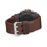 Close-up of the pin buckle on the Casio G-SHOCK Mudmaster Analogue Digital Men's Watch GG-B100XMH-5A, 51mm case, showing the dark brown resin band fastening. The buckle's secure, rugged design suits the watch's outdoor functionality.