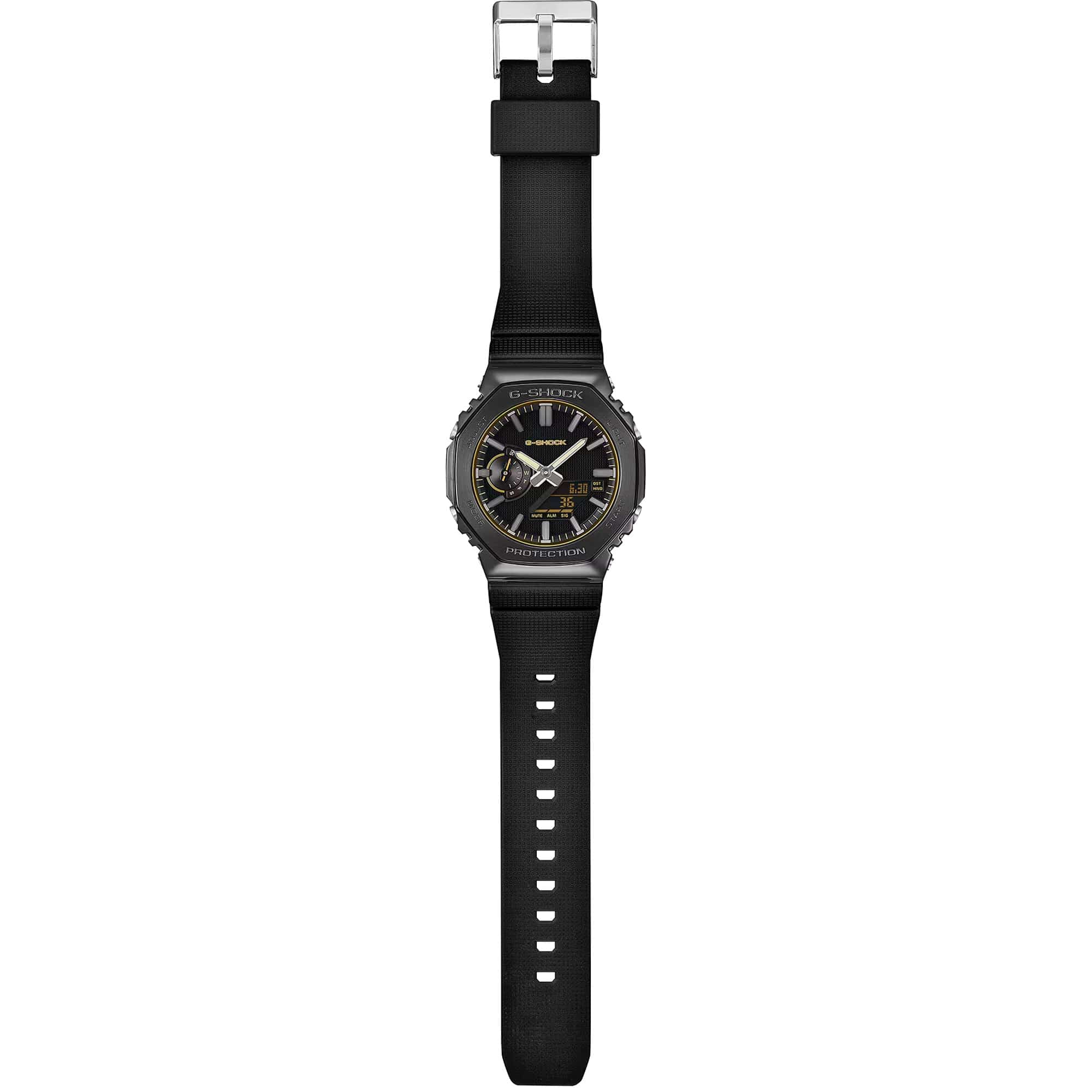 The Casio G-Shock Analogue Digital Men's Watch GM2100LXB-1A9 is fitted with a black bio-based resin band with standard buckle clasp, fitting wrists from 145mm to 215mm, with the solid case back confirming shock-resistant and 200-metre water-resistant construction.