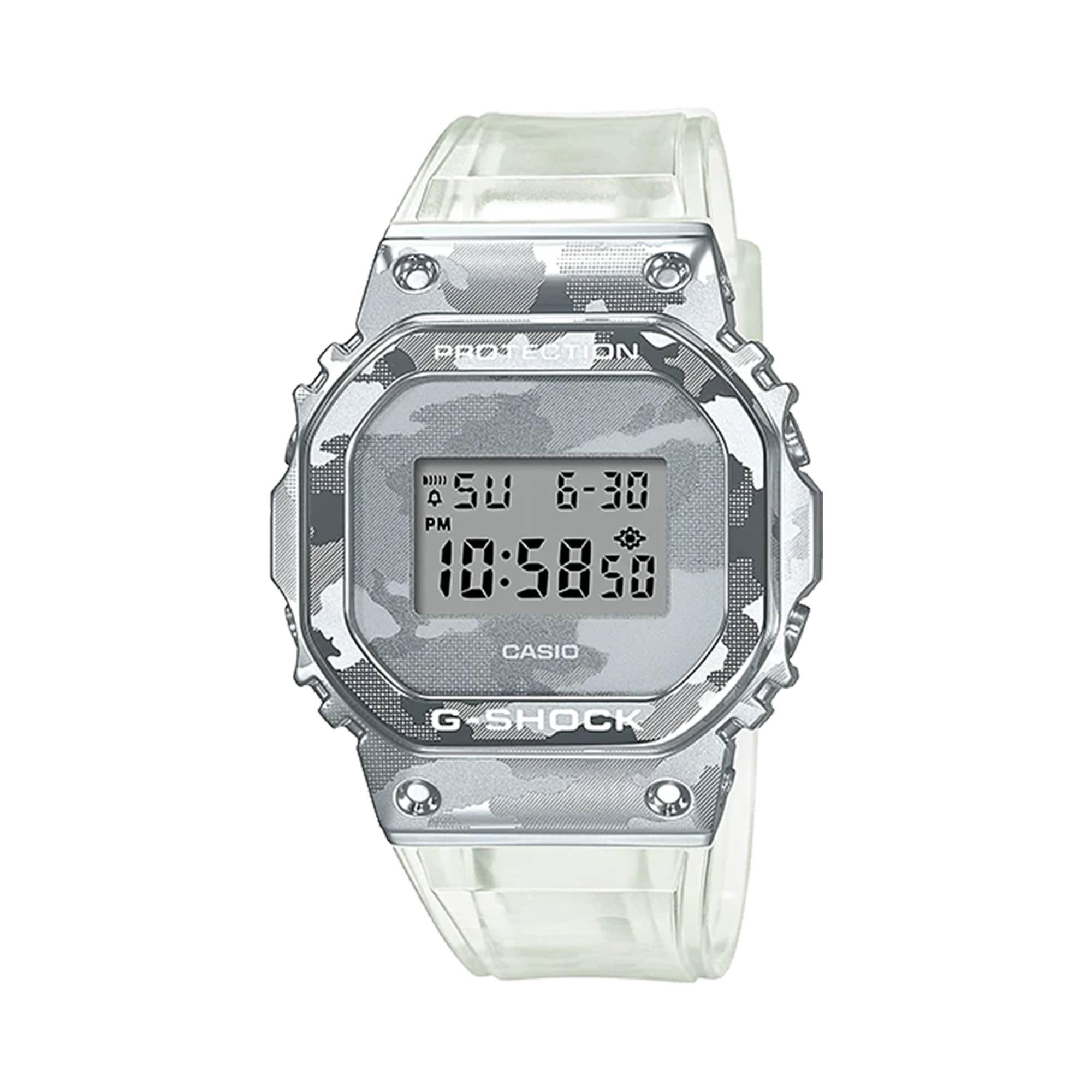 Casio G-SHOCK GM5600SCM-1 digital watch with stainless steel bezel, translucent skeleton resin band, camouflage dial print, and shock-resistant design.