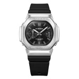 Three-quarter angle view of the Casio G-SHOCK 2500 Series Quartz Men’s Watch GMC2500-1A, 46.7mm case, highlighting the silver bezel and rounded octagonal case. The black dial and bar indexes are visible.