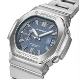Three-quarter angle view of the Casio G-SHOCK 2500 Series Quartz Men’s Watch GMC2500D-1A2, 46.7mm case, highlighting the silver bezel and rounded octagonal case. The blue dial and bar indexes are visible.