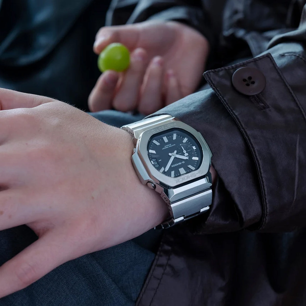 The Casio G-SHOCK 2500 Series Quartz Men’s Watch GMC2500D-1A, 46.7mm case, worn on the wrist. The stainless steel bracelet and black dial show the scale and fit.