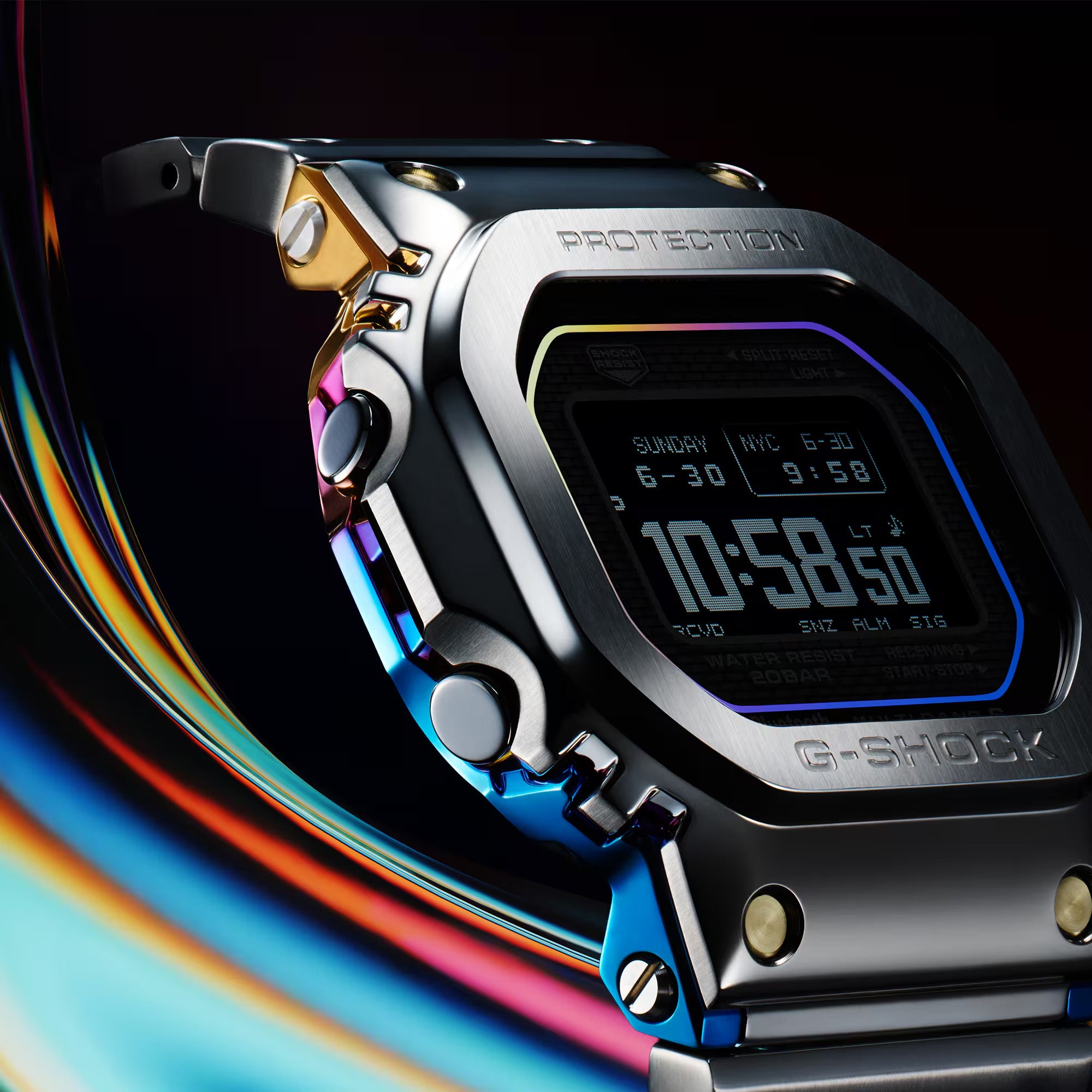 Casio G-Shock GMWBZ5000RC-1D front view showcasing the iconic square full-metal case with interlocking bezel-to-centre-case connection, gradient rainbow ion-plated centre case shifting brilliantly with the light, four gold IP front screws, rainbow vapour deposition glass border, and high-definition MIP LCD — the AI-generative designed GMW-BZ5000 in its most vivid colourway.