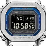 Close-up of the digital display on the Casio G-SHOCK Full Metal GMW-B5000D-2 Men's Digital Watch, 49mm case, showing the time, date and blue dial accent detail. The hairline and mirror finishing on the stainless steel bezel is also visible.