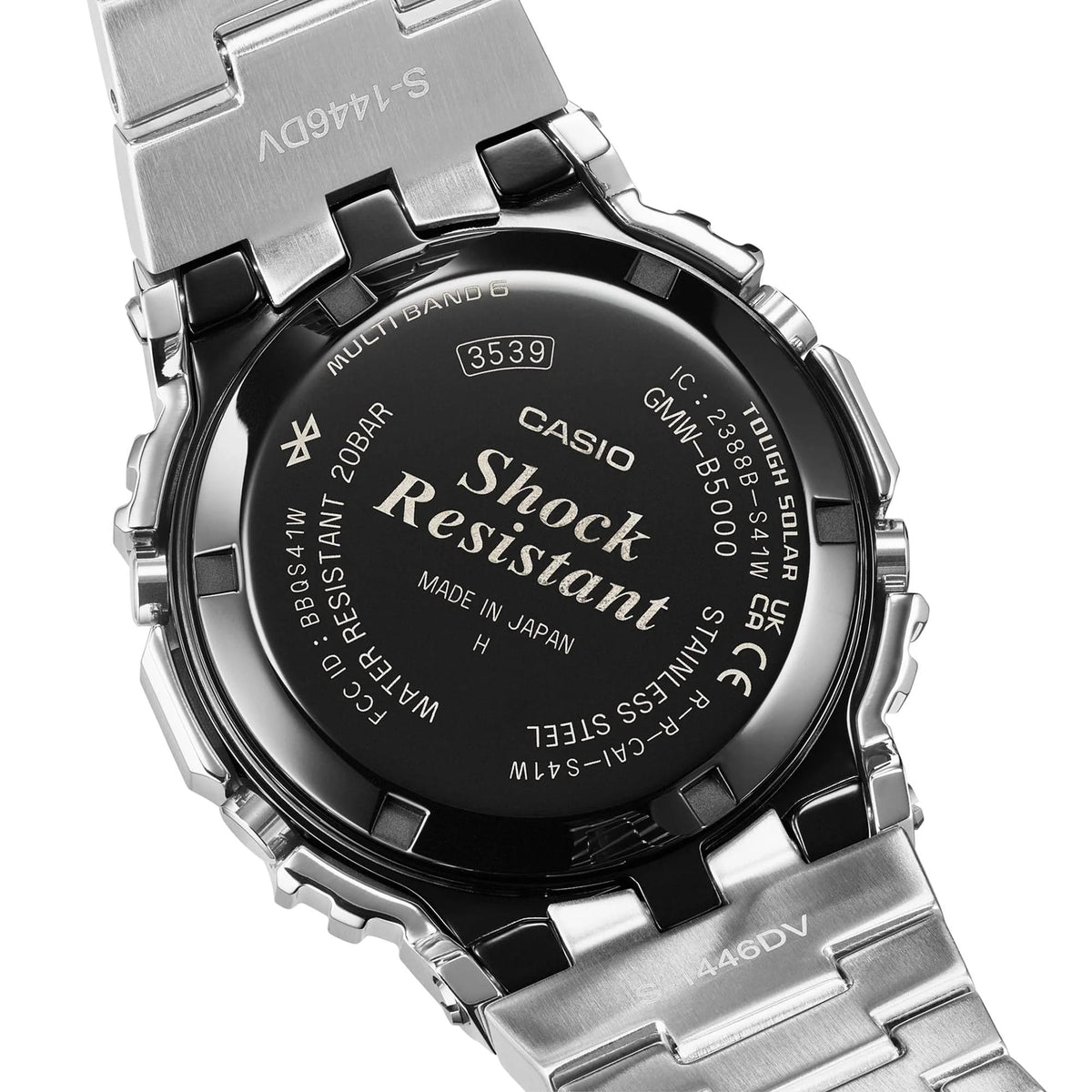 Back of the stainless steel band on the Casio G-SHOCK Full Metal GMW-B5000D-2 Men's Digital Watch, 49mm case. The dimpled metal band links and one-touch three-fold clasp are shown in detail.