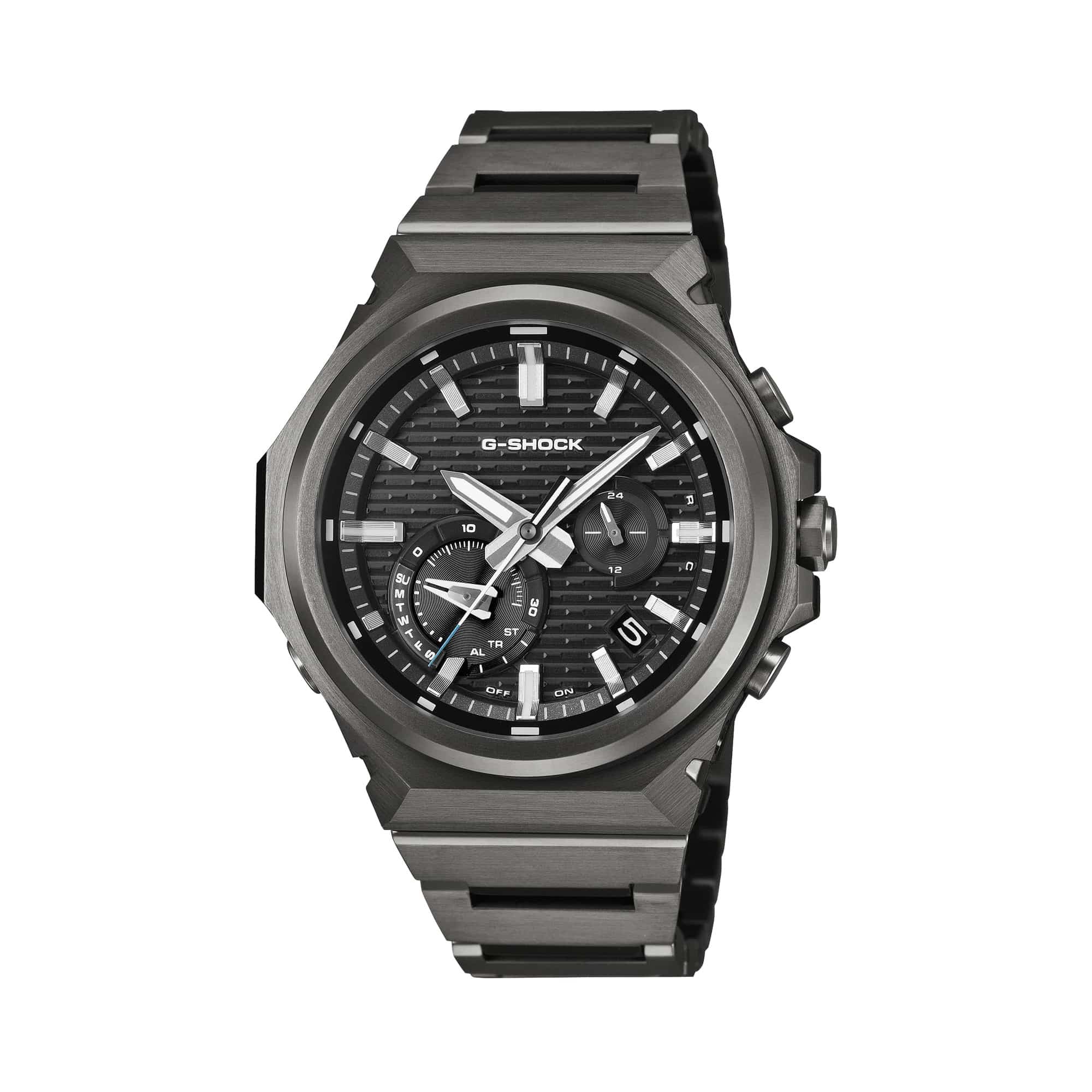The Casio G-Shock G-Steel Solar Men's Watch GSTB1000BD-1A features a logo-less black ion-plated stainless steel bezel with brick pattern detail, carbon fibre dial, and all-black solid stainless steel bracelet — 44.2mm, fully all-black from bezel to screws.