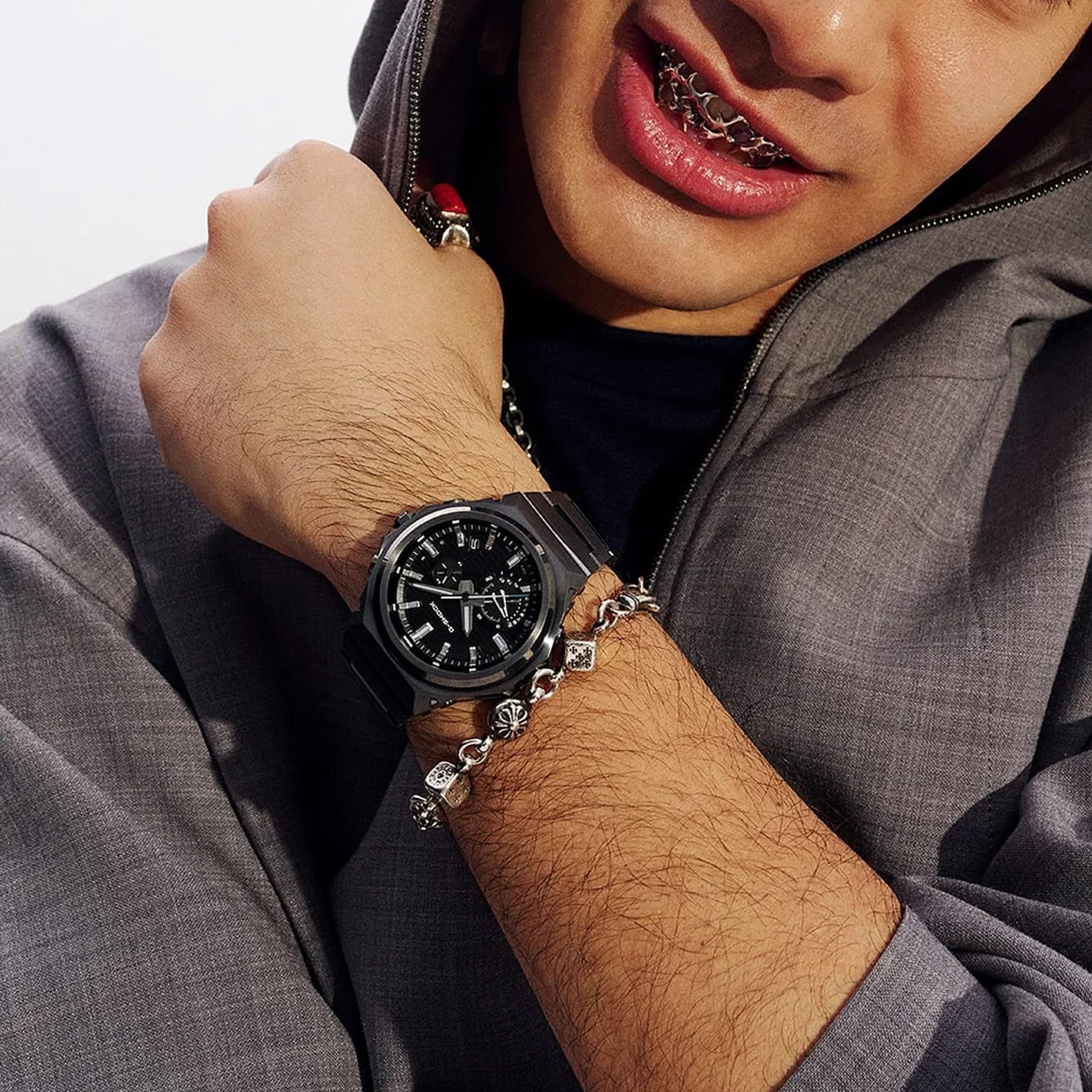 Worn on the wrist, the Casio G-Shock G-Steel Solar Men's Watch GSTB1000BD-1A demonstrates the slim all-black metal profile — equally at home in business, casual, and outdoor settings.