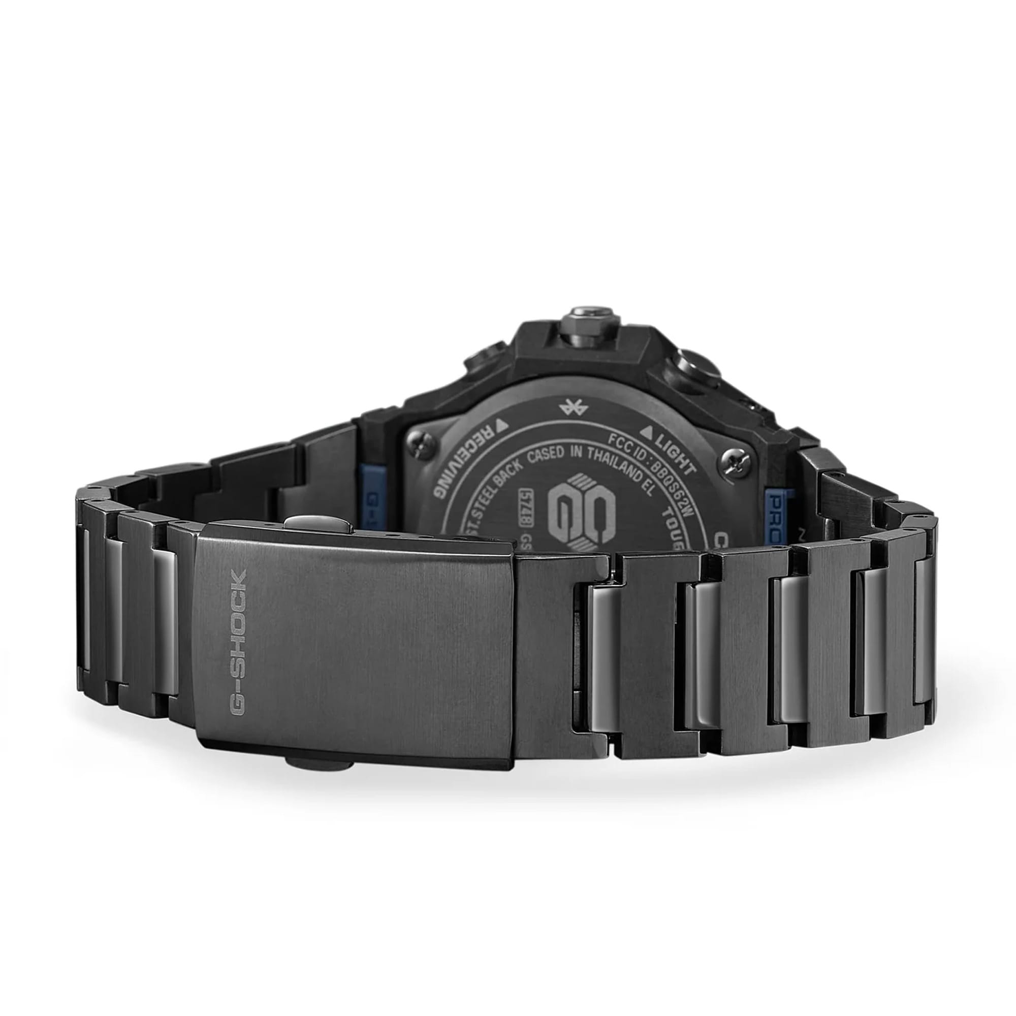 The Casio G-Shock G-Steel Solar Men's Watch GSTB1000BD-2A is fitted with a solid stainless steel bracelet combining hairline and mirror finishes, secured by a black ion-plated tri-fold clasp — with the all-black ion-plated case back confirming shock-resistant and 200-metre water-resistant construction.
