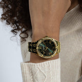 Worn on the wrist, the Guess Cosmo sits comfortably thanks to its balanced 36mm case size. The green sunray dial and crystal-embellished bezel add luxurious sparkle to any outfit.